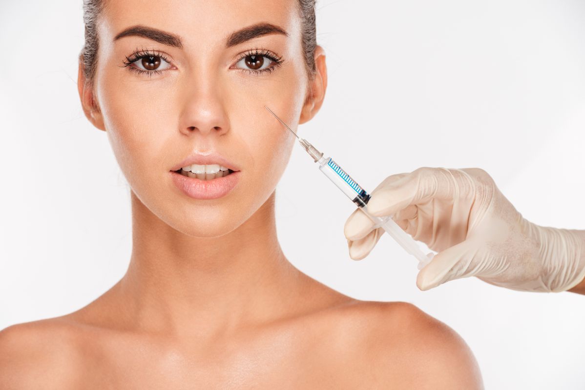 A woman and a sermorelin needle