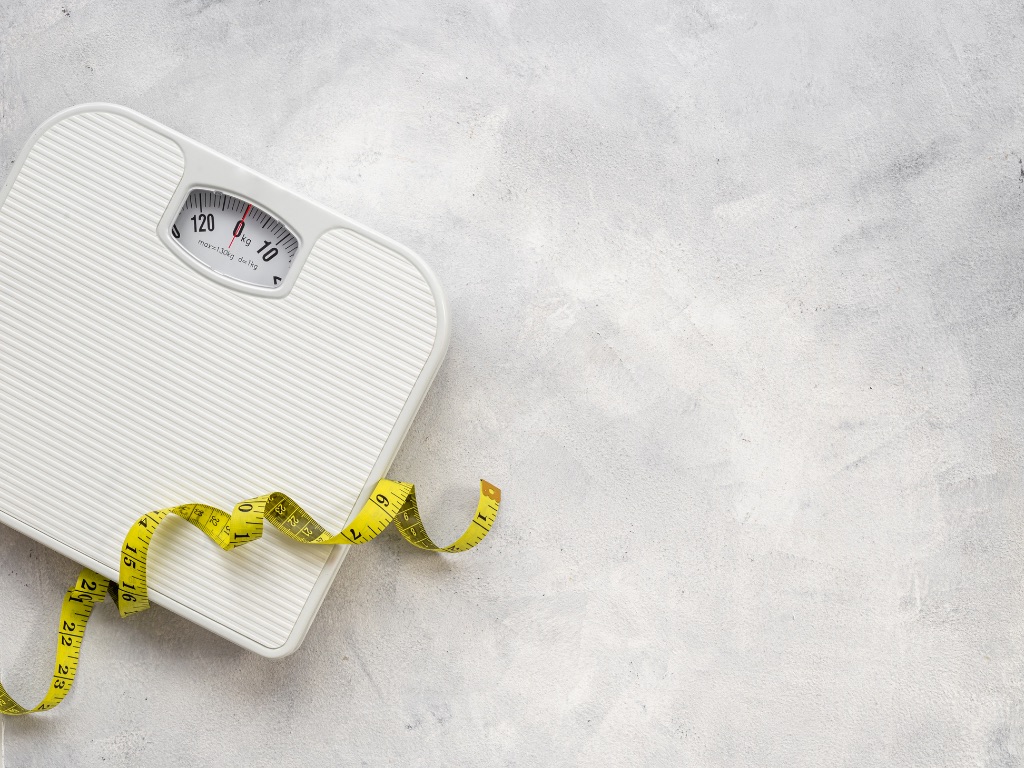 white scale on a marble floor